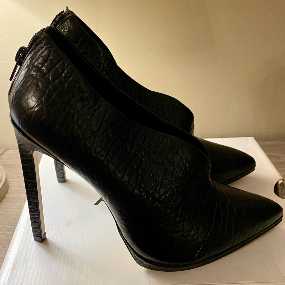 Black Aldo snake skin heels
